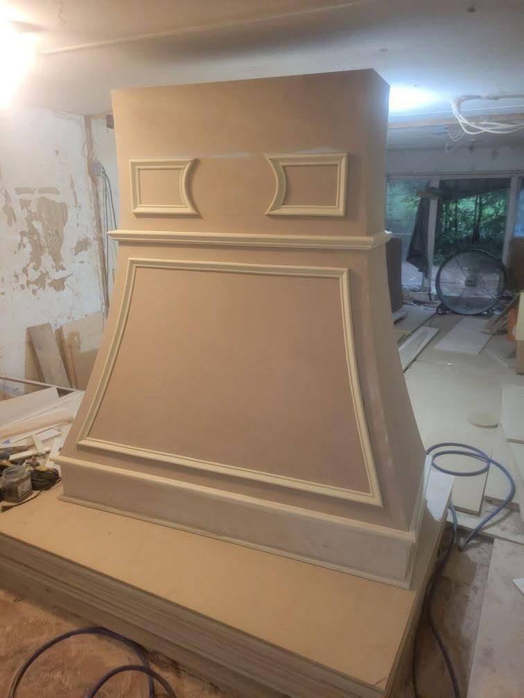 Custom wood range hood in the shop